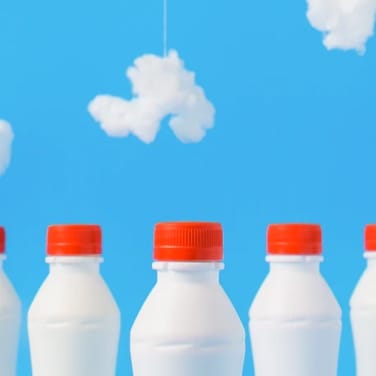 White Milk Bottles With Red Caps